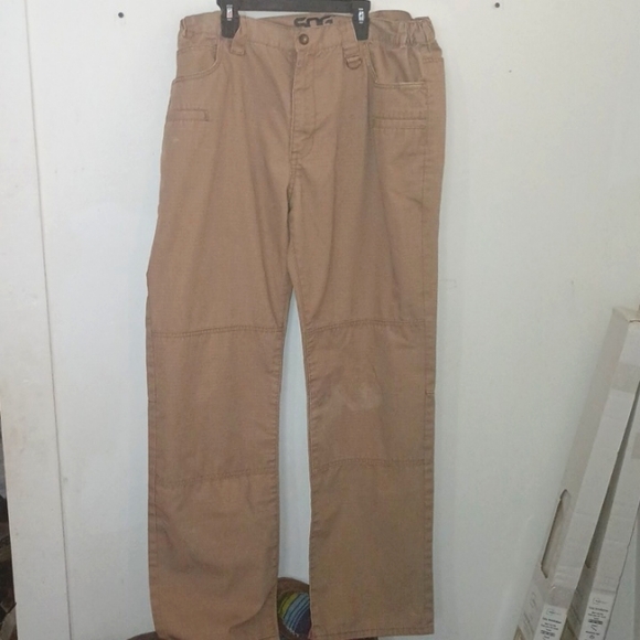 Sog  pants see pics for stain in knee  makes for great work pants - Picture 1 of 4
